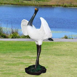 crane garden statues