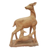 Outdoor deer statues