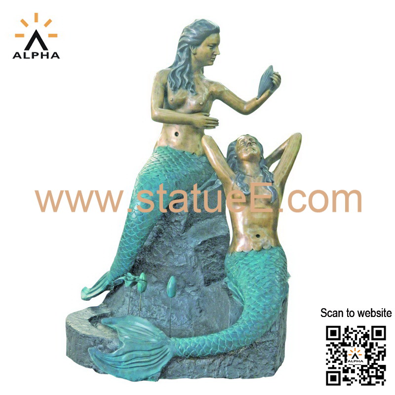 Bronze mermaid fountain